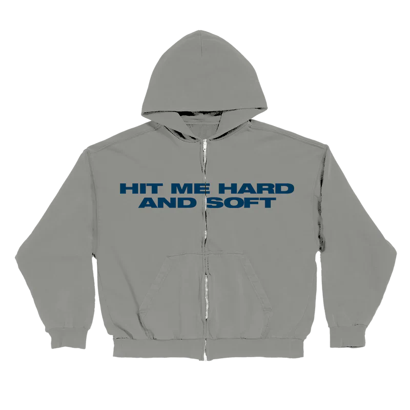 Front view of Billie Eilish Hit Me Hard And Soft Grey Zipper Hoodie with bold blue text 'HIT ME HARD AND SOFT