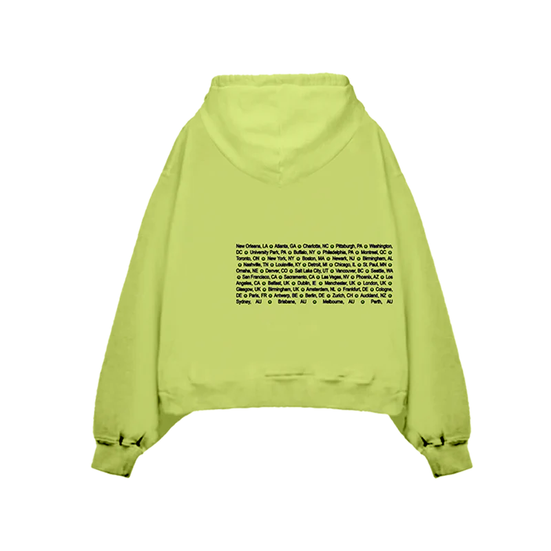 Back view of the lime green Happier Than Ever Tour Hoodie from Billie Eilish merch, listing the tour cities for "The World Tour 2022" in black text.